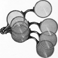 Set of four ophthalmological glasses of varying shades.